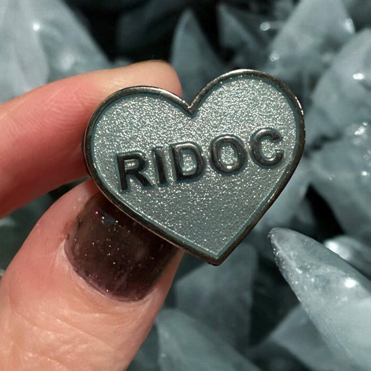 Ridoc Enamel Pin
